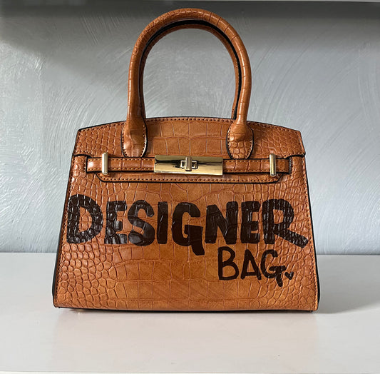 Brown croc bag.