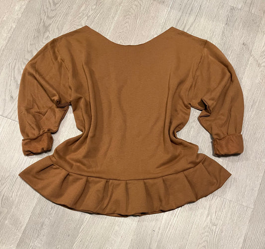Ruffle tunic.