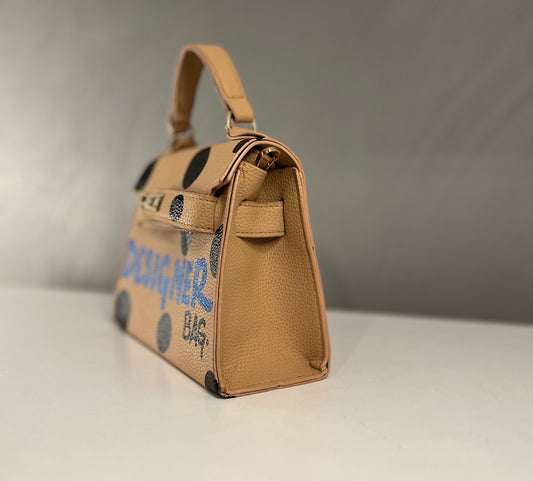 Polka dot Designer bag.