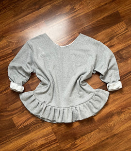 Ruffle tunic top.