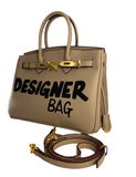 HER designer bag.