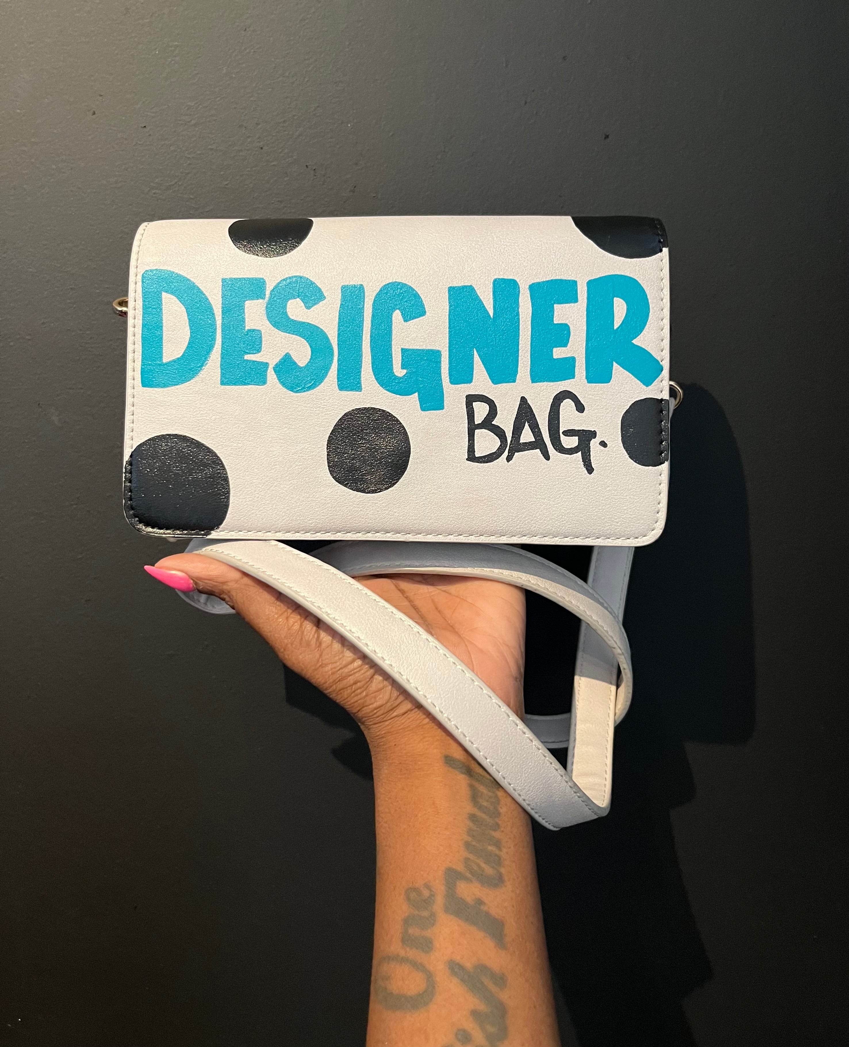 Black Dot Designer bag.