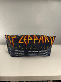 Def Leppard tee bag.