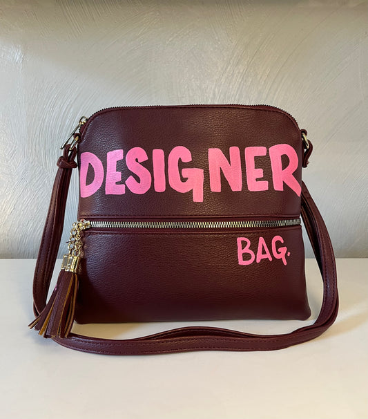 Burgundy Designer bag.