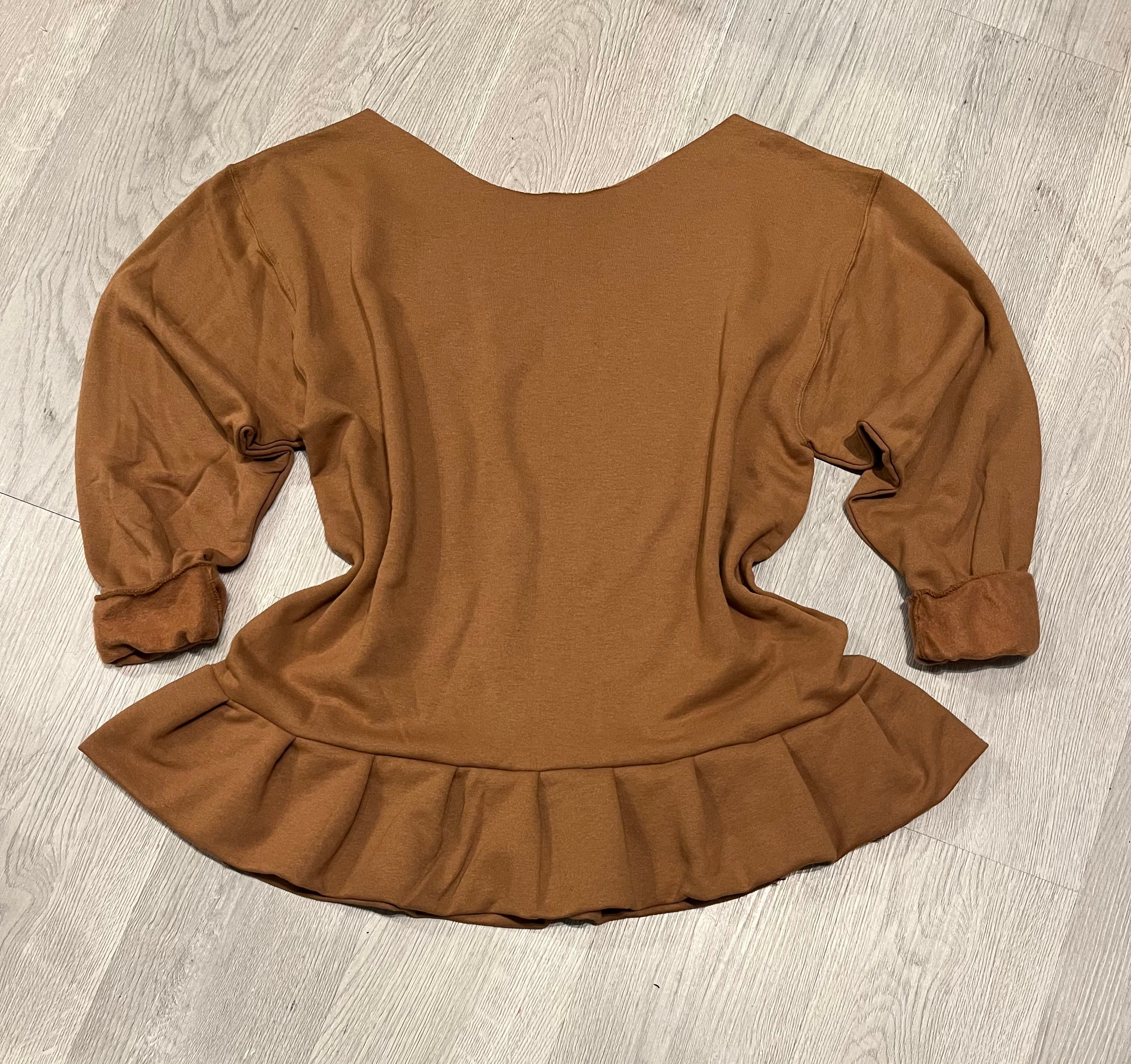 Ruffle tunic.