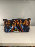 Def Leppard tee bag.