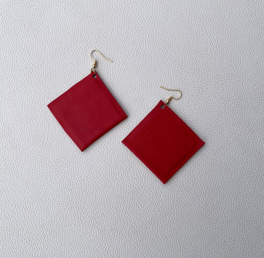 Red leather earrings.
