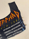 Def Leppard tee bag.