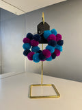 Pom Pom hoops.