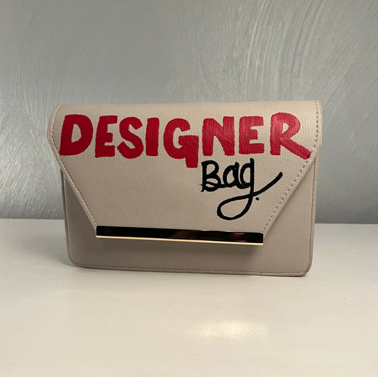 Cream Designer bag.